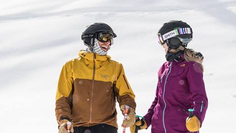 Couple skiing together