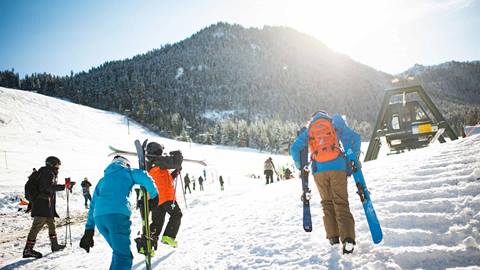 Skiers hiking