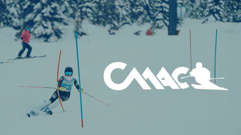 Ski racer weaving through slalom gates with the CMAC (Crystal Mountain Alpine Club) logo overlay at Crystal Mountain Resort