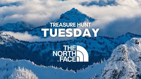 Treasure Hunt Tuesday event graphic featuring The North Face logo over a snow-covered mountain peak at Crystal Mountain Resort