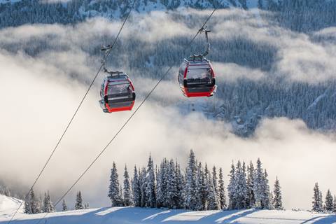 Crystal Mountain Scenic Gondola with fog and the valley in the background. 