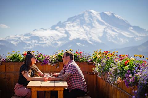 couple dines at the Summit House during summer