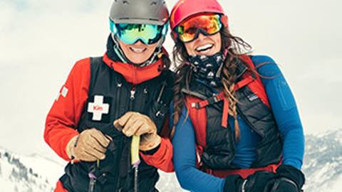 Ski Patroller and skier