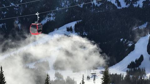 Gondola Cabin over cloudy valley