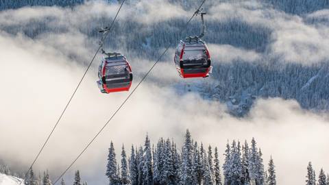 Gondola Cabin over cloudy valley